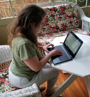 Jenny Writing in Sun Porch